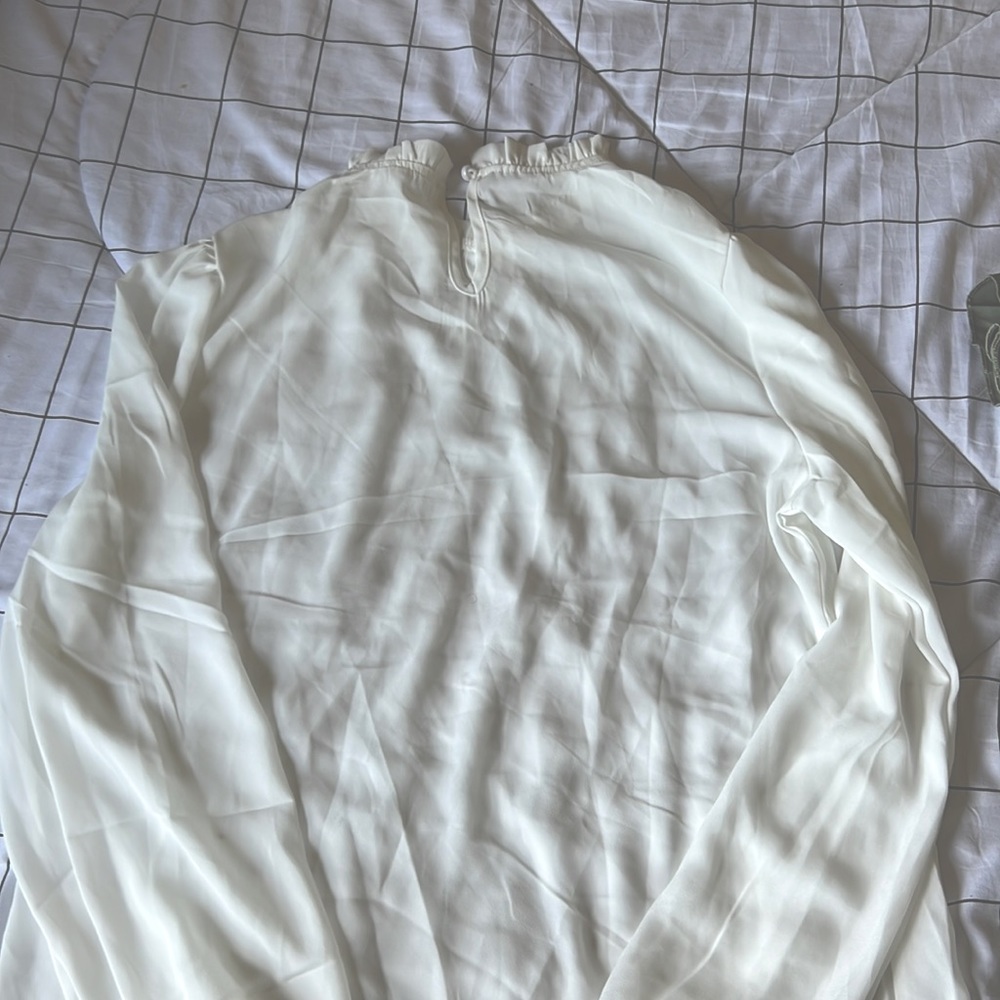 This beautiful shirt was to small for me around my arms. Very minimalist vibe. - Picture 2 of 4